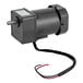A black Noble Products drive motor with wires and a wire harness.