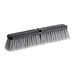 An O-Cedar commercial push broom head with black and white polystyrene bristles.