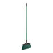 An O-Cedar green angle broom with a long green handle.