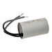 A white Cooking Performance Group conveyor motor capacitor with black wires and a black cover.