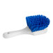 An O-Cedar blue and white utility brush.