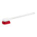 A white O-Cedar utility brush with red bristles.