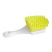 An O-Cedar yellow and white utility brush.