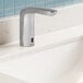 An American Standard NextGen Selectronic touchless lavatory faucet with a chrome finish on a counter.