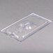 A clear plastic Vollrath Super Pan slotted lid.