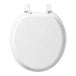 A white Bemis round toilet seat with lid up.