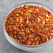 A bowl of Kari-Out Company Crushed Red Chilies.