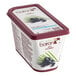 A container of yogurt with Les Vergers Boiron Acai Puree on top.