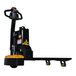 A Big Joe black and yellow hand pallet truck.