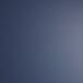 A close up of a navy blue vinyl surface with a white spot.