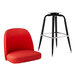 A red vinyl bucket seat on a black metal Lancaster Table & Seating barstool.