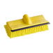 A yellow brush head with black bristles.