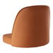 A Lancaster Table & Seating light brown vinyl bucket seat cushion on a chair.