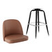 A brown chair with a black pole and a black Lancaster Table & Seating barstool.