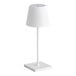 A Zafferano America Poldina Pro Mini white cordless table lamp with a white stand and shade.