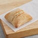 A piece of Bridor sourdough ciabatta bread on a cutting board.