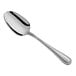 A Choice Milton stainless steel serving spoon with a silver handle and spoon.
