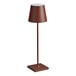 A brown Zafferano America Poldina Pro table lamp on a stand.