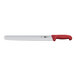 A Victorinox meat slicing knife with a red Fibrox handle and a Granton edge.