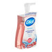 A bottle of Dial Power Berries foaming hand soap with a pink label and pump.