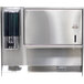 An Advance Tabco stainless steel paper towel and soap dispenser box with a black plastic cover.