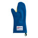 A blue Tucker Safety oven mitt with a white label.