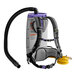 A ProTeam backpack vacuum with straps and a hose.