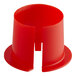 A red plastic ServIt conduit bushing with a hole in the middle.