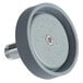 A grey circular T&S pre-rinse spray head assembly with a screw in the center.