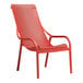 A red Net Lounge Corallo chair with armrests and a mesh back.