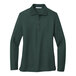 A dark green Port Authority women's long sleeve polo shirt.