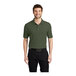 A man wearing a clover green Port Authority® polo shirt.