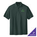 A dark green Port Authority polo shirt with the logo for Forge.