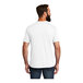 A man wearing a white AllMade t-shirt.