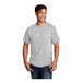 A man smiling and wearing a Port & Company unisex ash short sleeve t-shirt in grey.
