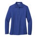 A royal blue Port Authority long sleeve polo shirt for women.