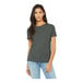 A woman wearing a Bella + Canvas deep heather grey customizable scoop neck t-shirt.