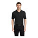 A man wearing a black Port Authority® silk touch pique® polo.
