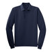 A navy blue Port Authority® long sleeve polo shirt.