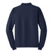 A navy Port Authority long sleeve polo shirt.