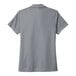 A grey Nike polo shirt with a white collar.