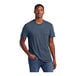 A man wearing a heathered blue District T-shirt.