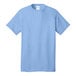 A light blue Port & Company T-shirt.