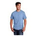 A man wearing a light blue Port & Company short sleeve t-shirt.