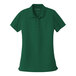 A Port Authority women's deep forest green short sleeve polo shirt.