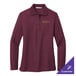 A Port Authority women's long sleeve burgundy polo shirt with gold embroidery.