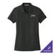 A black Port Authority women's polo shirt with pink custom text that says "Stix" on the front.