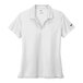 A white Nike polo shirt with a black logo.