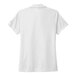 A white Nike polo shirt.