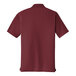 A Port Authority burgundy polo shirt.
